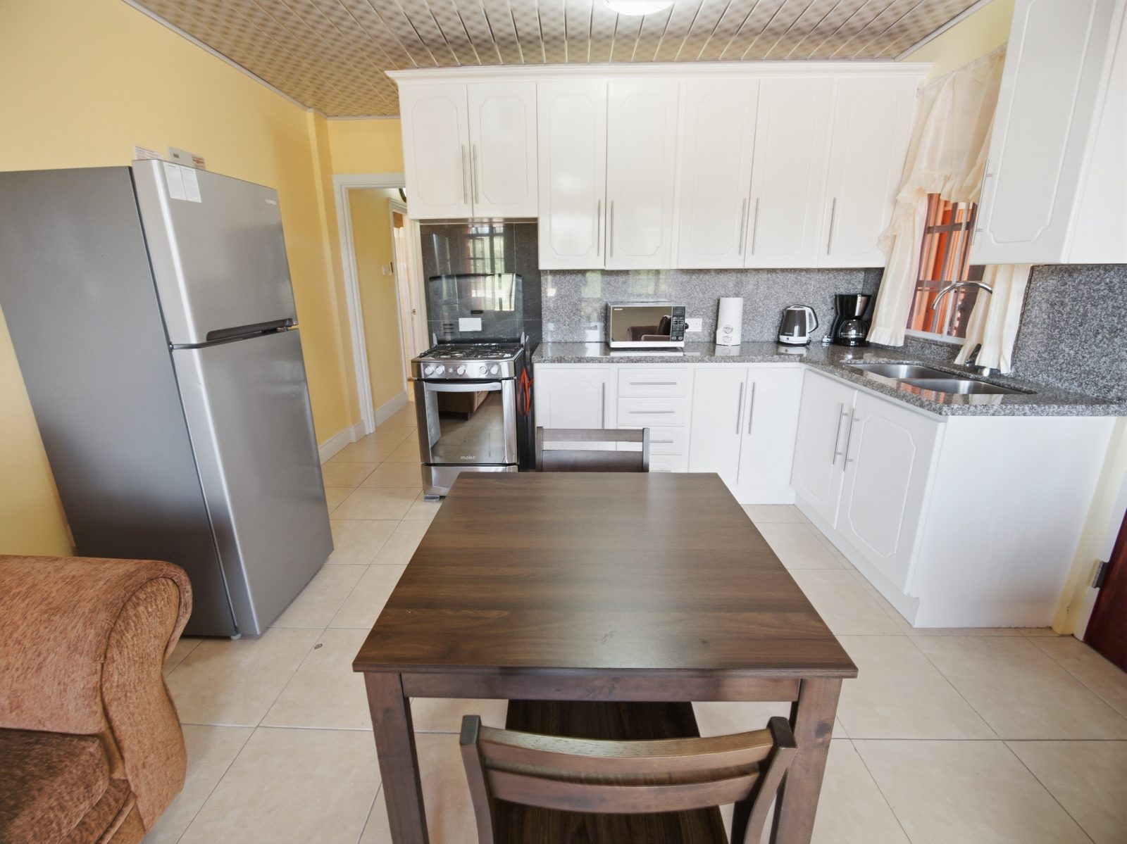 One Bedroom kitchen and dining table