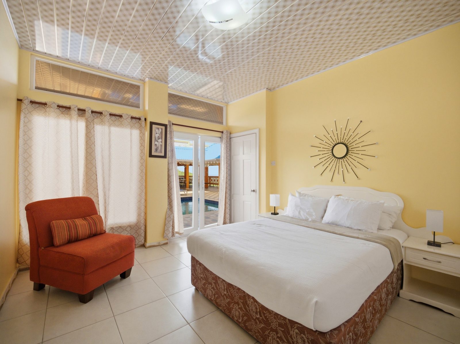 Poolside Suite bedroom with pool view