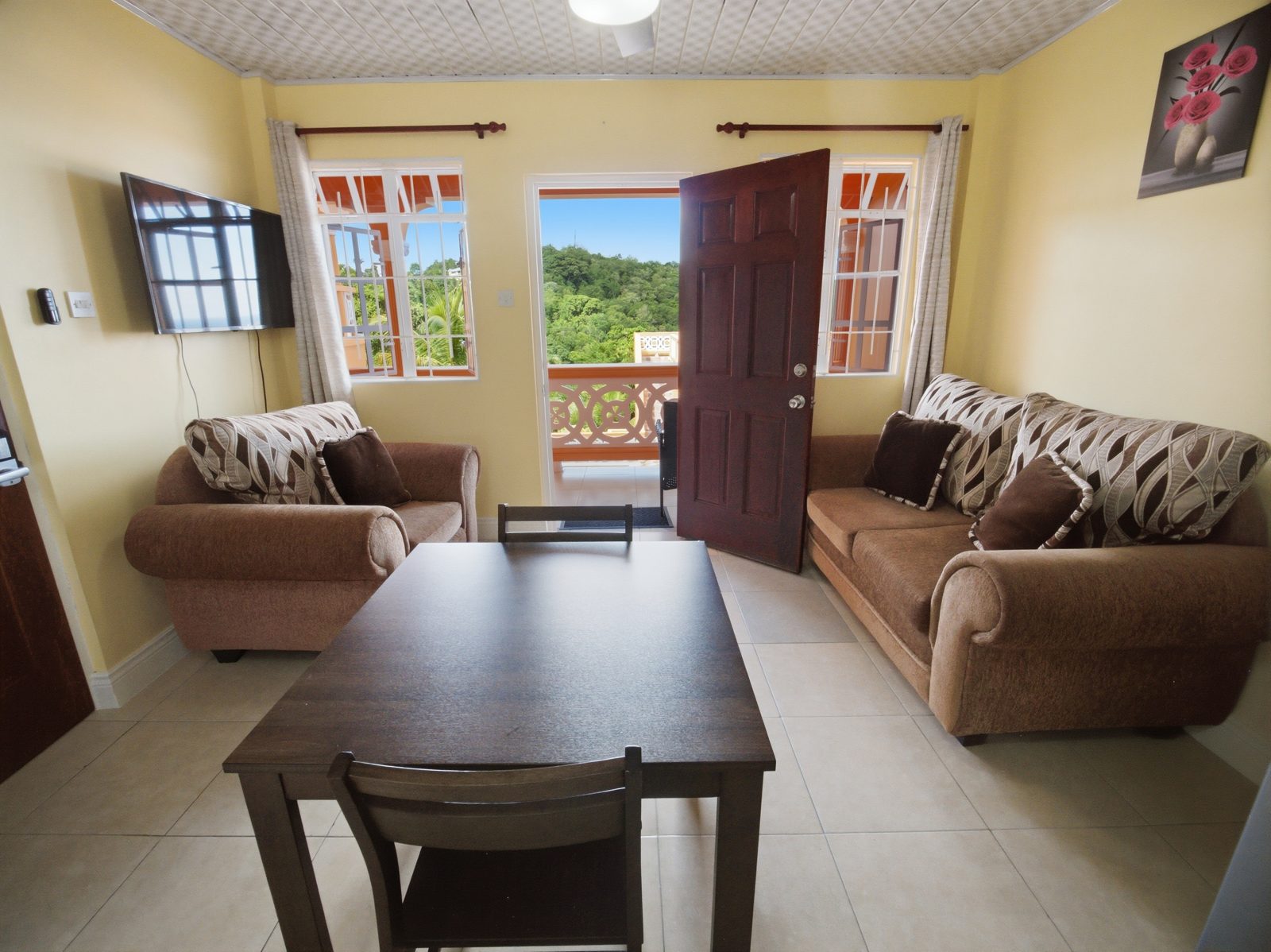 One Bedroom living and dining room with balcony view