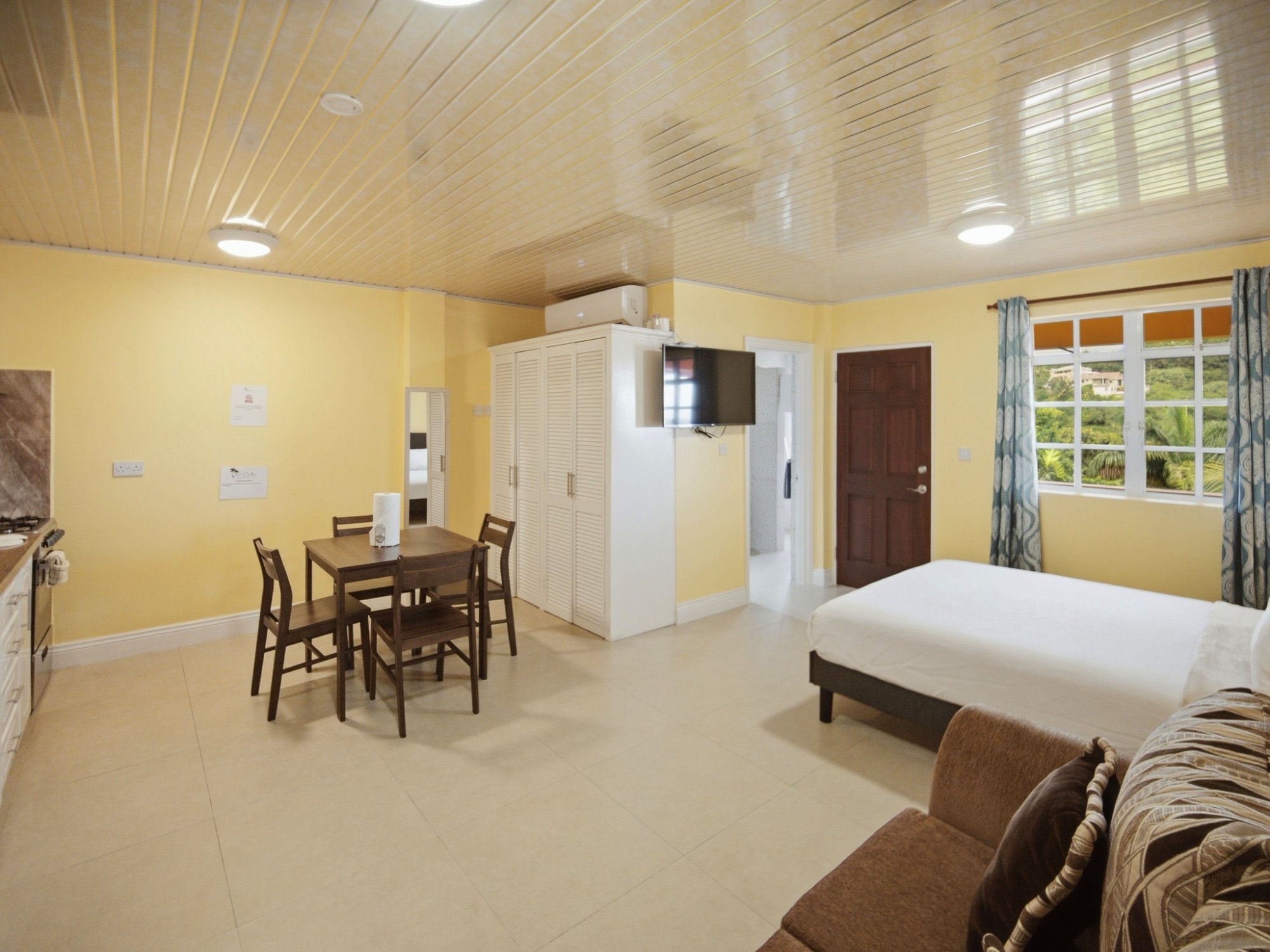 Studio living and sleeping area with kitchenette